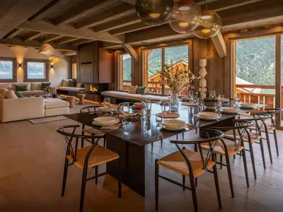 a dining room with a large table and chairs at Chalet Mussol - OVO Network in Saint-Gervais-les-Bains
