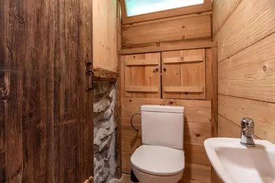 a bathroom with a toilet and a sink at Le Gite - L'oréade - 6 pax in Saint-Gervais-les-Bains