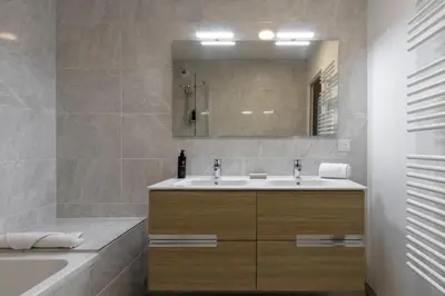a bathroom with a sink and a mirror at Le 201 - Proche Centre Ville - Ski In - Ski Out in Saint-Gervais-les-Bains