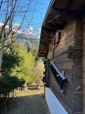 a building with a window on the side of it at Chalet Le 1853 in Chamonix-Mont-Blanc