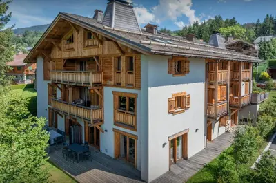 an aerial view of a house with wooden balconies at Sundance Kid Loft - OVO Network in Megève