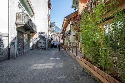 a street in a town with a building at Spacious loft on pedestrian street with views in Chamonix-Mont-Blanc