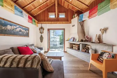 a bathroom with a toilet and a sink and a shower at Spacious loft on pedestrian street with views in Chamonix-Mont-Blanc