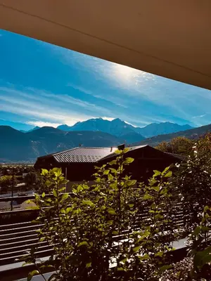 a view of a mountain range from a house at Vue sur le MontBlanc in Domancy