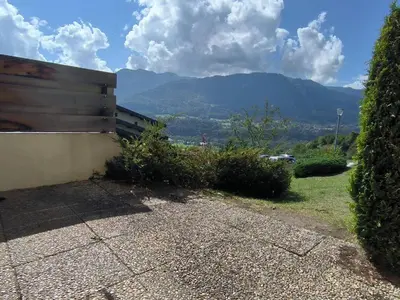 a view of a mountain from the side of a house at Appartement T3 familial rénové à Samoëns, animaux acceptés - FR-1-624-161 in Samoëns