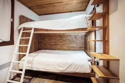 a bunk bed in a room with two bunk beds at Flat Sofia - Authentic charm in Demi-Quartier