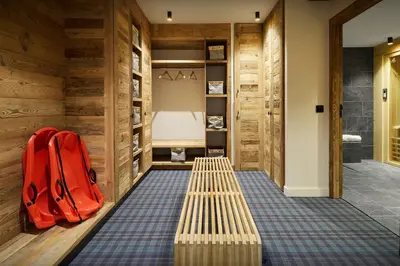a sauna with a bench and a red backpack at Chalet Piccolo - OVO Network in Saint-Gervais-les-Bains