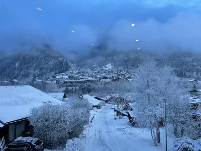 a village covered in snow in a mountain at Chalet Cristal I in Les Contamines-Montjoie