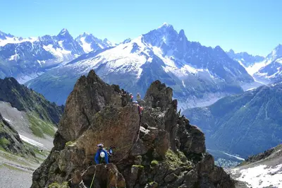 a group of people standing on top of a mountain at Evasion Sérénité à Chamonix Mont-Blanc in Chamonix-Mont-Blanc