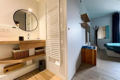 a bedroom with two bunk beds and a bed at Spacious T2 in the heart of Chamonix in Chamonix-Mont-Blanc
