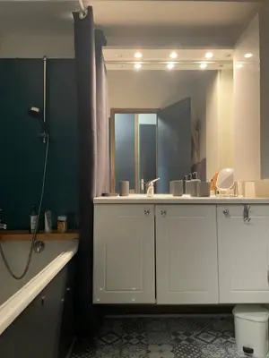 a bathroom with a sink and a mirror at Le Carolaz Studio cosy et familial pour 4 personnes in Les Contamines-Montjoie