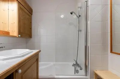 a bathroom with a shower and a sink at Les Carlines in Les Contamines-Montjoie