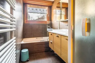 two bunk beds with white pillows in a room at Comfort nature and exceptional Mont Blanc view in Chamonix-Mont-Blanc
