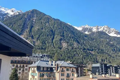a view of a city with a mountain in the background at Two bedroom apartment, Hypercenter, terrace Mont Blanc, parking in Chamonix-Mont-Blanc