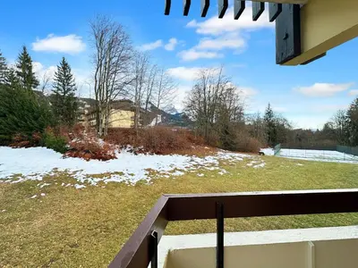 a view of a yard with snow on the ground at AT101 Appartement 6 Pers proche base de loisirs in Les Carroz d'Araches