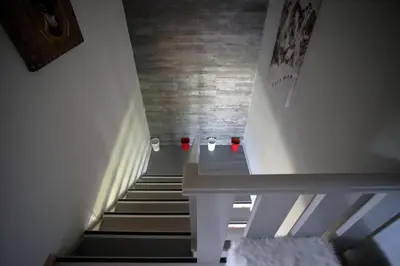 a staircase in a house with a stair case at CH719 - Chalet 10 Pers aux Carroz in Les Carroz d'Araches
