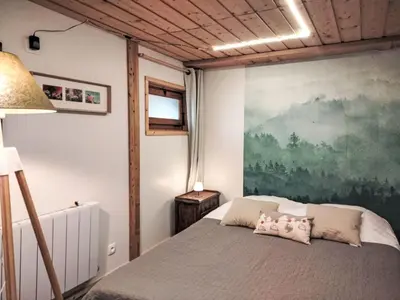 two twin beds in a room with a window at Apartment Chalet du Rosay by Interhome in Saint-Gervais-les-Bains