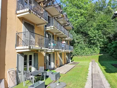 a kitchen with a table and chairs in a room at Apartment Conseil-9 by Interhome in Saint-Gervais-les-Bains