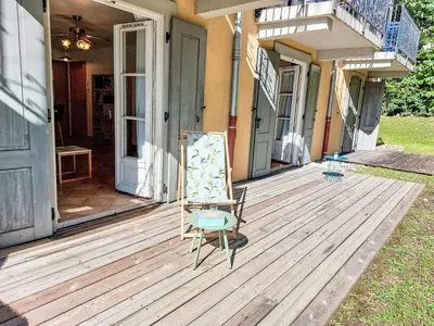 a small blue stool sitting on the porch of a house at Apartment Conseil-9 by Interhome in Saint-Gervais-les-Bains