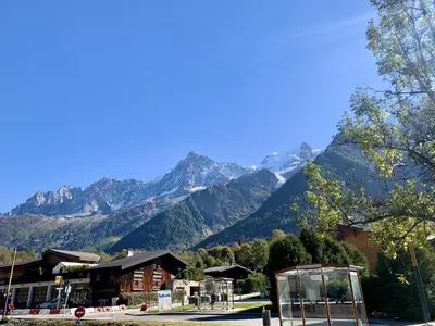 a view of a mountain range from a town at Cristal Des Alpes - Superb T3 - Vue Mont-Blanc in Les Houches