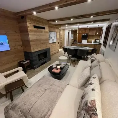 Appartement chaleureux à Megève - 80 m² avec jardin et cheminée.