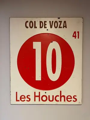a red and white sign with the number at Panorama MontBlanc in Domancy