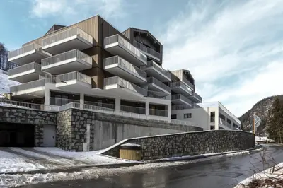 a rendering of a building in the snow at Apartment Léo -Espace bien-être -Piscine in Les Houches