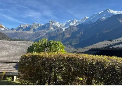 a view of a mountain range from a house at Hameau de la Côte in Les Houches
