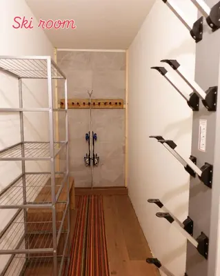 a walk in shower in a room with a glass door at Le Chalet 138 Megève séjour pour 8 confort espace charme calme in Demi-Quartier