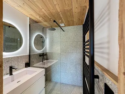 a bathroom with a sink and a shower at Chalet de luxe avec vue Mont Blanc et parking - FR-1-560-150 in Sallanches