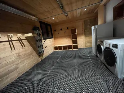 a laundry room with a washer and dryer at Chalet de luxe avec vue Mont Blanc et parking - FR-1-560-150 in Sallanches