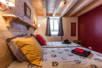 a bedroom with a bed in a room at Chalet Atelier Chalet Chamonix in Chamonix-Mont-Blanc
