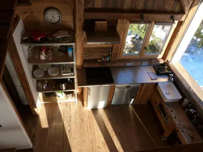 an overhead view of a kitchen in a tiny house at La Cubelette in Chamonix-Mont-Blanc