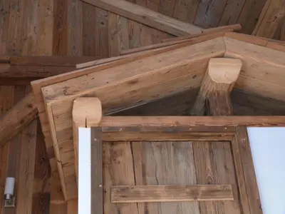a wooden ceiling in a room with wood at La Cubelette in Chamonix-Mont-Blanc