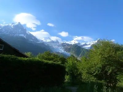 a view of a mountain range with snow covered mountains at La Cubelette in Chamonix-Mont-Blanc