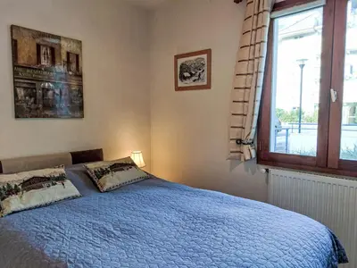 a bedroom with a bed with a tray on it at Apartment Domaine de Crespin-5 by Interhome in Saint-Gervais-les-Bains