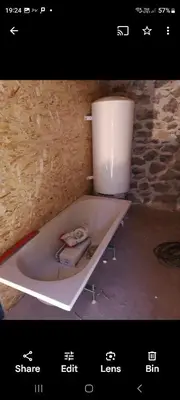 a picture of a bath tub in a room at Chalet Vince in Samoëns