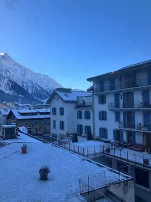 a group of people riding bikes by a mountain lake at Magnifique Appartement au Centre de Chamonix in Chamonix-Mont-Blanc
