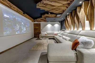 a living room with a couch and a table at Chalet Cotes du Lavancher in Chamonix-Mont-Blanc