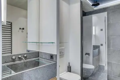 a bathroom with a sink and a toilet at Appartement Orso in Megève