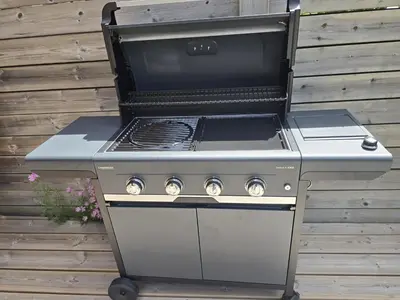 a barbecue grill sitting on top of a table at Premium 200sqm Chalet in Chamonix Valley ! in Chamonix-Mont-Blanc