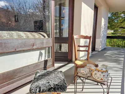 a sign that says antiques on a brick wall at Apartment La côte du Parc-2 by Interhome in Saint-Gervais-les-Bains
