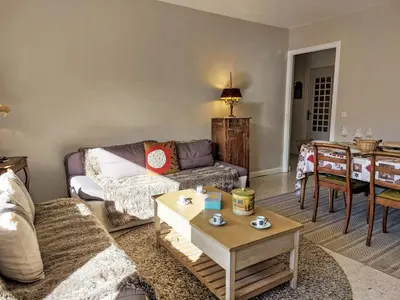 a living room with a couch and a table at Apartment La côte du Parc-2 by Interhome in Saint-Gervais-les-Bains