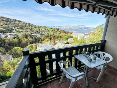 a table and chairs on a balcony with a view at Studio La Comtesse-11 by Interhome in Saint-Gervais-les-Bains