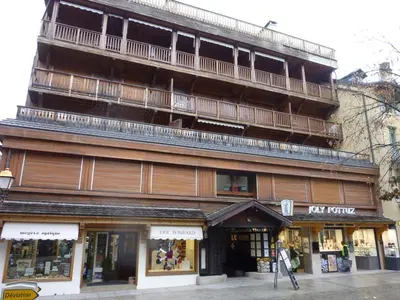 a tall building with a balcony on top of it at Appartement 3 chambres avec terrasse au cœur de Megève - FR-1-453-316 in Megève