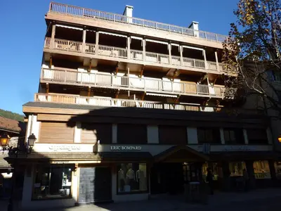 a tall building with a balcony on top of it at Appartement 3 chambres avec terrasse au cœur de Megève - FR-1-453-316 in Megève