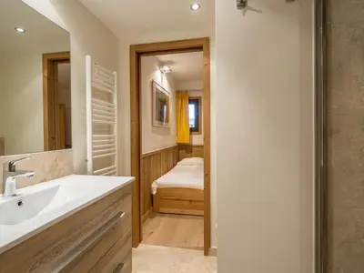 a bathroom with a sink and a shower at Appartement 3 chambres avec terrasse au cœur de Megève - FR-1-453-316 in Megève