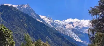 a view of a mountain with snow covered mountains at Appt Cosy au centre Chamonix in Chamonix-Mont-Blanc