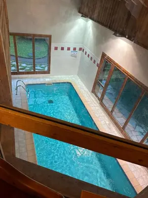 an overhead view of a swimming pool in a house at Appartement Samoëns in Samoëns