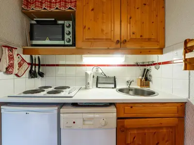a bedroom with bunk beds in a house at Les Eterlous - 8 - Appt Montagne 4-6 pers in Morillon